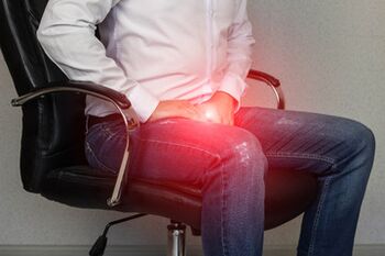 A man with prostatitis signs